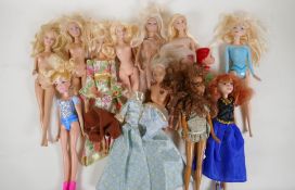 Twelve Barbie dolls by Mattel