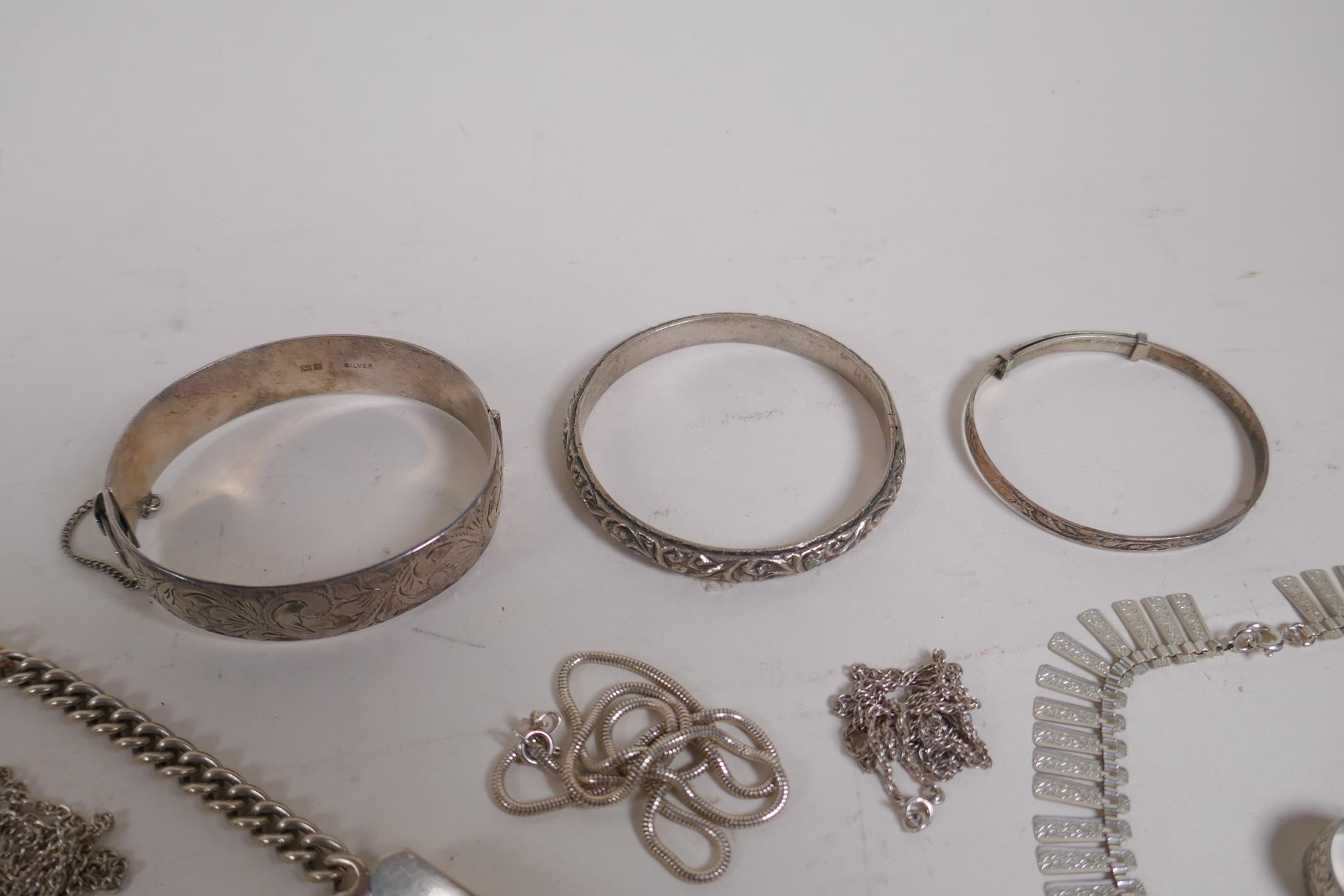 A collection of hallmarked silver jewellery, bangles, chains and necklaces, 199g - Image 3 of 7