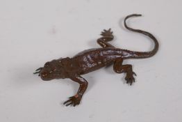 A Japanese bronze okimono lizard, 14cm long