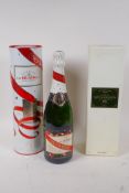 A bottle of 2000 G.H. Mumm & Co Cordon Rouge Brut Champagne, in a commemorative Greenwich Meridian