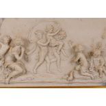 A reconstituted marble plaque depicting putti at play, 31 x 19cms, in a heavy gilt frame