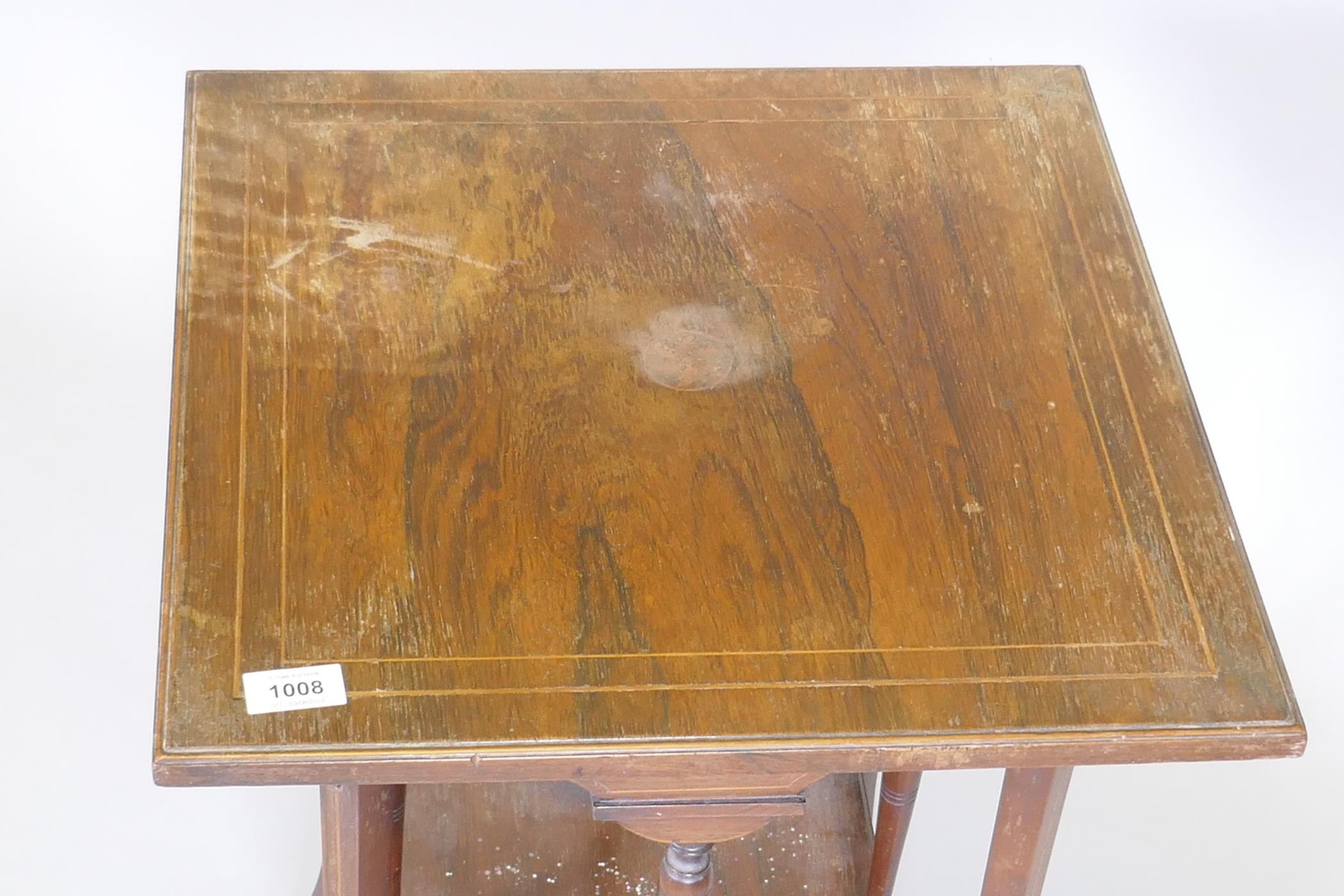 Victorian two tier rosewood occasional table, with boxwood lining, raised on sabre supports, one - Image 2 of 4