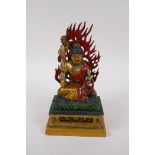 A Tibetan cold painted bronze of a wrathful deity, 20cm high