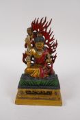 A Tibetan cold painted bronze of a wrathful deity, 20cm high