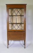 A Victorian inlaid mahogany display cabinet with an astragal glazed door, 75 x 36cms, 164cm high