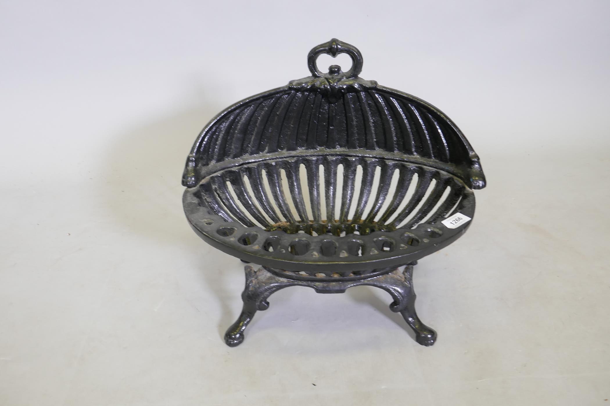 A C19th painted cast iron fire basket, 49 x 45cm