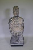 A life size C20th Chinese pottery bust of a terracotta warrior, 130cm high