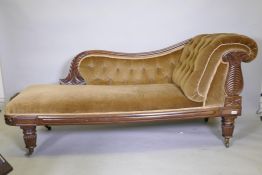 A Regency mahogany chaise longue, with carved Grecian style decoration, raised on turned and