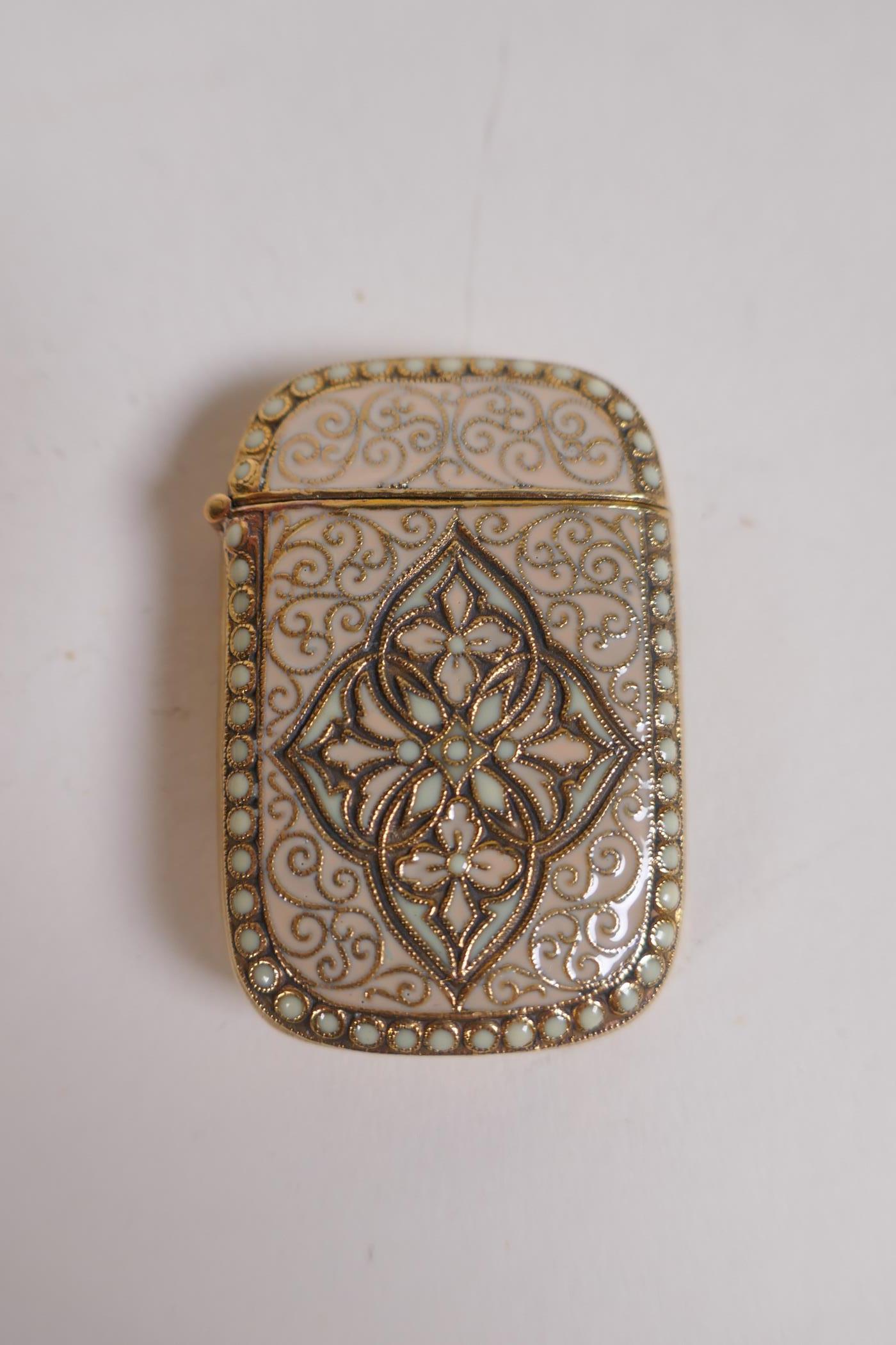 A brass and enamel Anderson style vesta case, 3 x 5cm