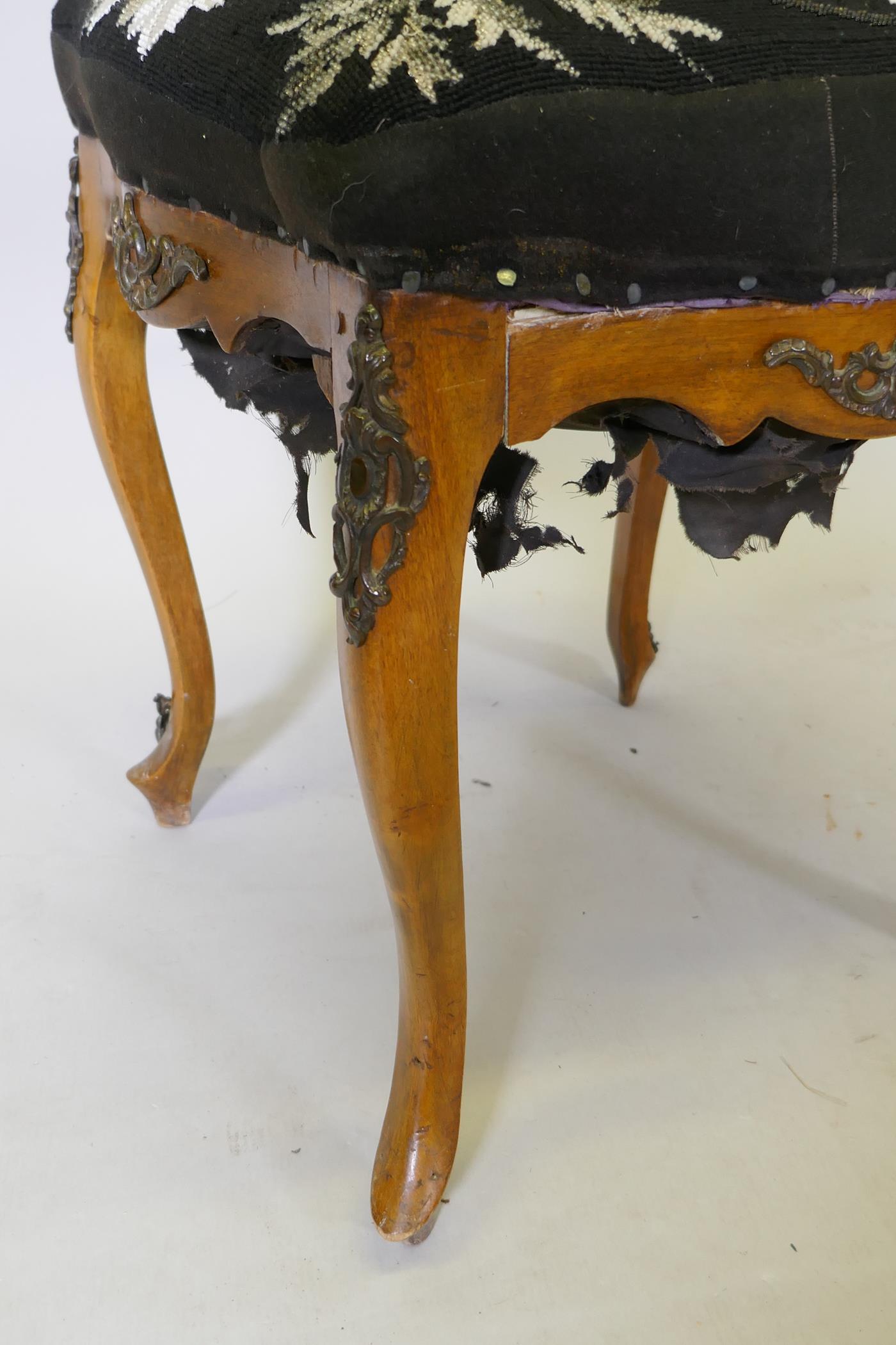 A C19th walnut stool with beadwork cover and ormolu mounts, raised on cabriole supports, AF, 39 x - Image 3 of 3