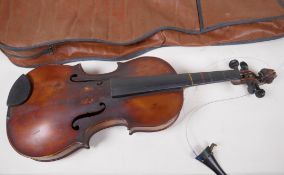 A vintage violin with two piece back and ebony turners, labelled Copple Ludovicus P...Pigola, 59cm