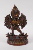 A Sino Tibetan bronze figure depicting the deities Chakrasamvara  and Vajravarahi, 18cm high