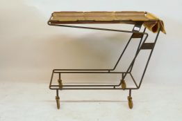 A mid century metal hostess trolley, with three removable beechwood trays, 42 x 85 x 70cms