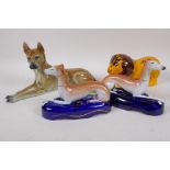 A pair of Staffordshire pottery greyhound inkwells, 16cm long, a continental  porcelain figure of