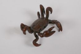 A Japanese bronze okimono crab, mark to base, 6cm long