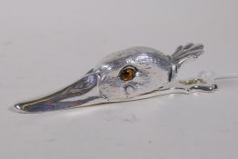 A silver plated duck head document clip, 12cm long