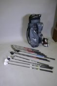 A mixed set of left handed gold clubs by Ping, Callaway, TaylorMade, (12 clubs), in a Power Caddy