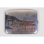 An early C20th Japanese sterling silver cigarette case with engraved decoration depicting the