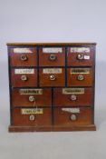 A C19th mahogany apothecary's chest of ten drawers, with eglomise labels and glass handles, adapted,