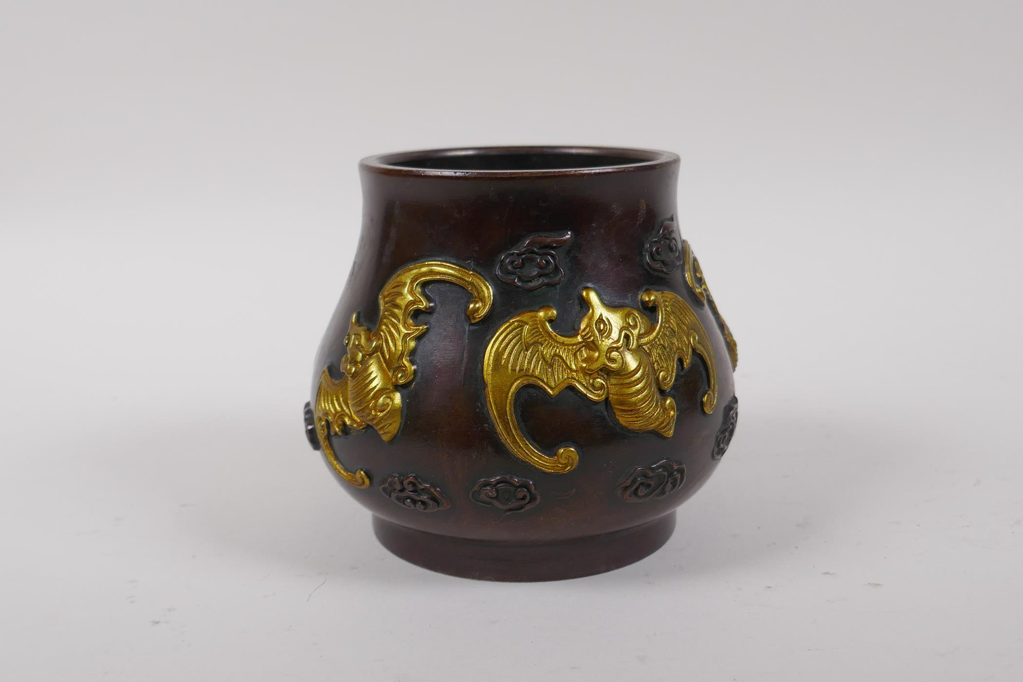 A Chinese bronze censer with raised and gilt bat decoration, impressed 4 character mark to base,