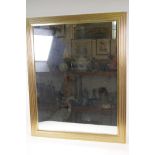 A reeded gilt framed wall mirror, 81 x 65cm overall