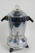 A mid C20th chrome plated electric coffee percolator with Bakelite handles and feet, by Davidson