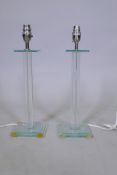 A pair of contemporary lucite table lamps, 40cm high