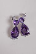 A pair of 925 silver and amethyst pear shaped drop earrings, 3cm drop