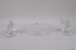 A Lalique glass plate with galleon design, 21.5cm diameter, and a pair of Lalique glass pin trays