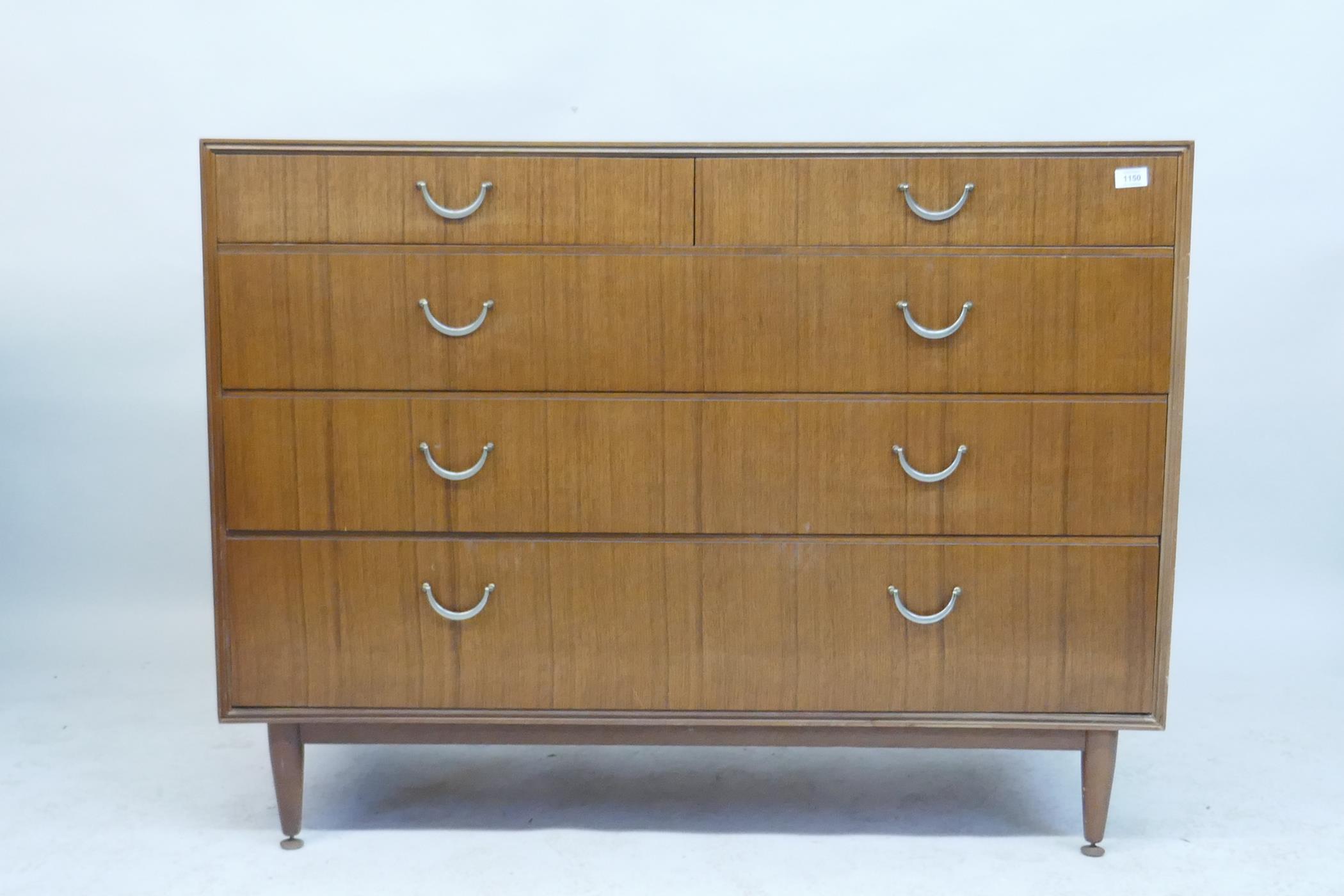 A 1970s Meredew teak chest of drawers, two short over three long, 122 x 55cms, 93cm high