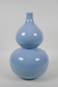 A duck egg blue glazed porcelain double gourd vase, Chinese Qianlong seal mark to base, 32cm