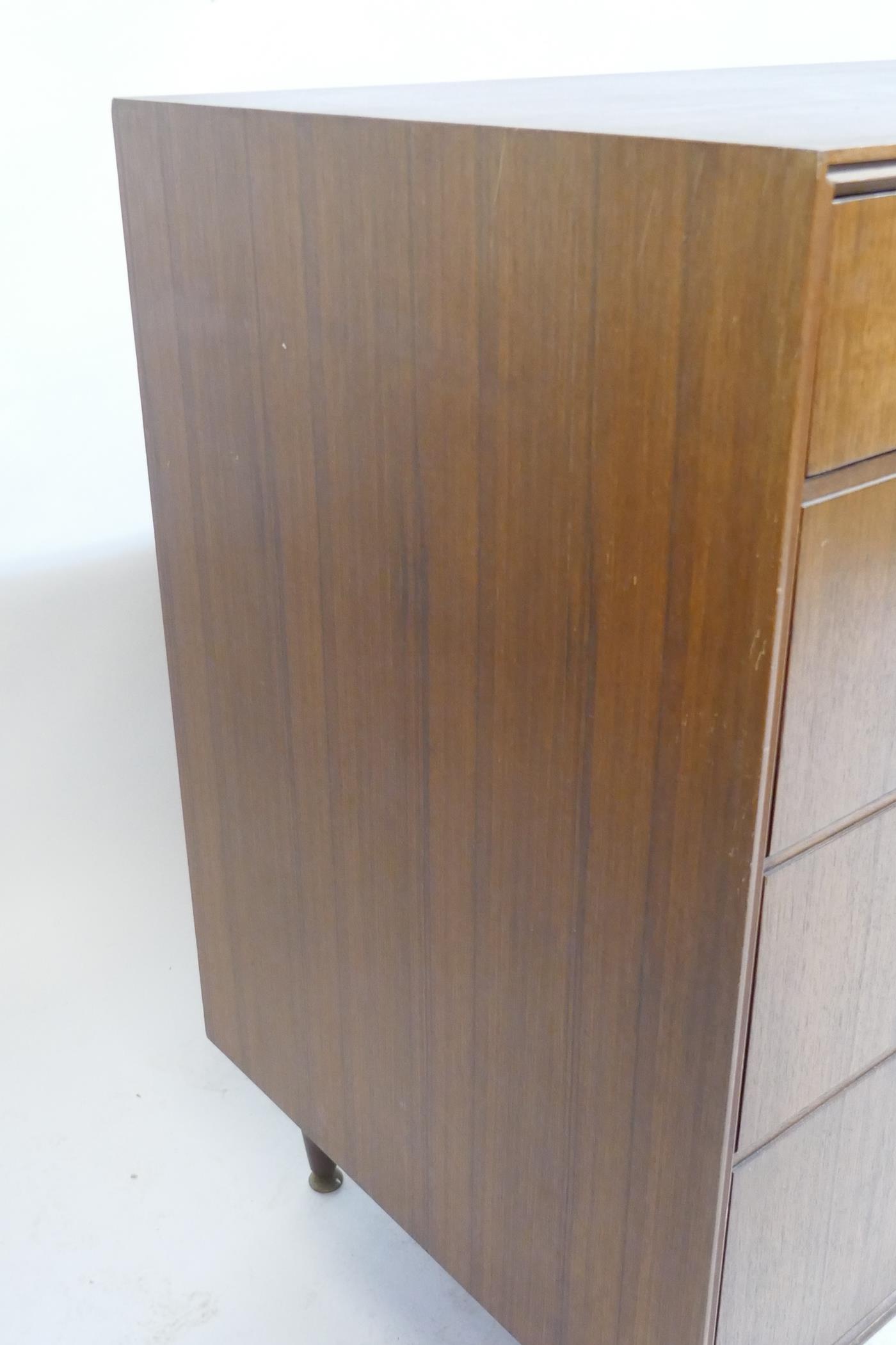 A 1970s Meredew teak chest of drawers, two short over three long, 122 x 55cms, 93cm high - Image 4 of 4