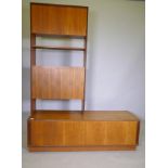 A mid century G Plan Form Five teak modular wall system consisting of a base unit with sliding doors