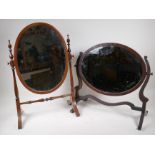 An Edwardian inlaid mahogany oval plate swing toilet mirror on easel frame, 64cm high (cross brace