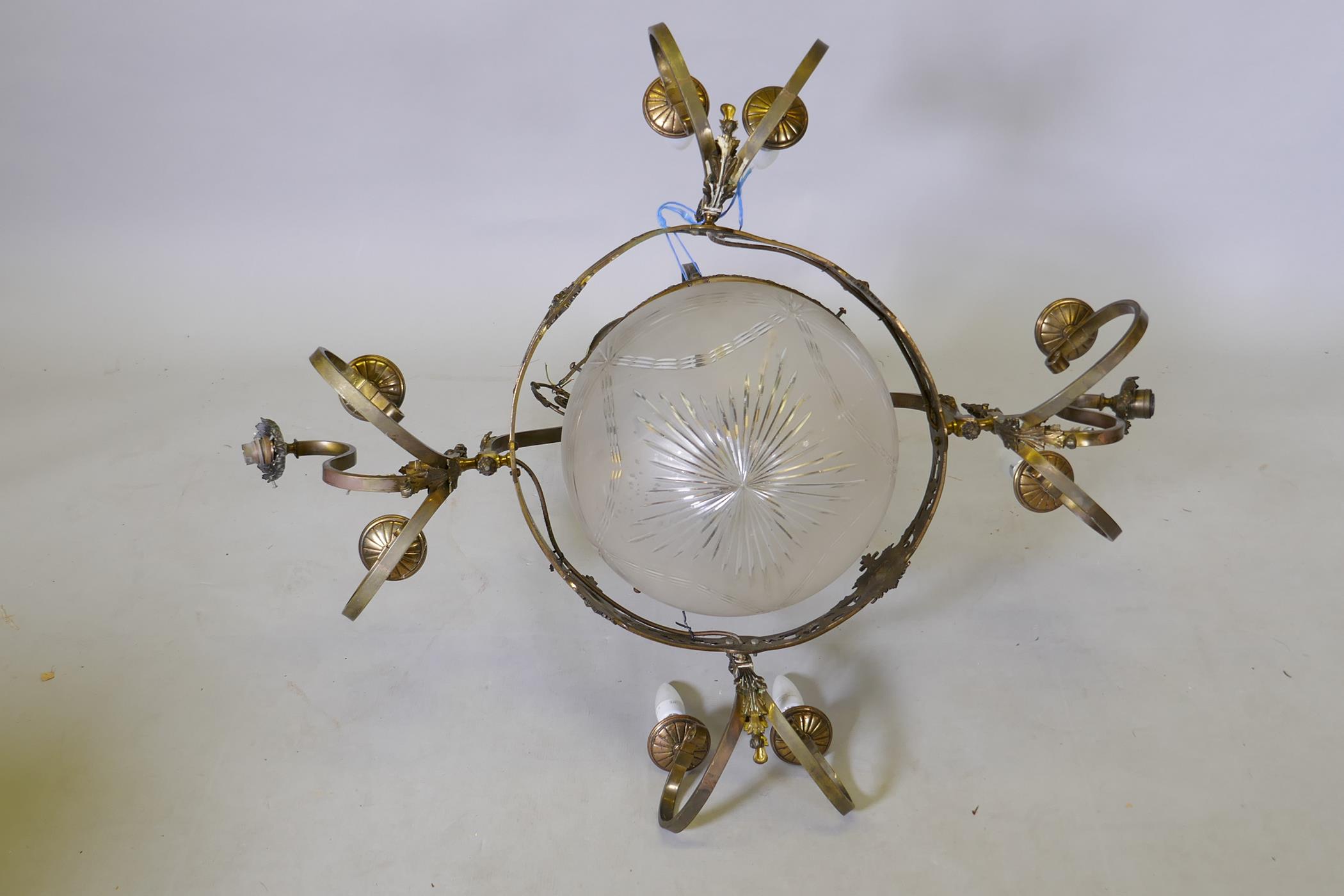 An early C20th bronze four branch, twelve lamp hanging ceiling lamp with etched and cut glass shade, - Image 3 of 4