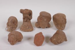 A quantity of ancient Indian terracotta head busts, largest 10cm