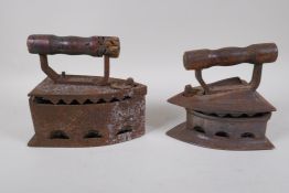 An antique cast iron coal iron and another, largest 21cm long