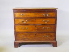 A Georgian mahogany chest, with brushing slide over four graduated cock beaded drawers, solid top,