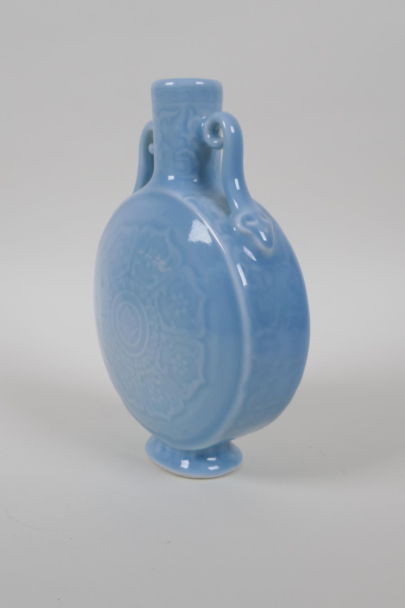 A duck egg blue glazed porcelain moon flask with two handles and underglaze lotus flower decoration, - Image 2 of 4