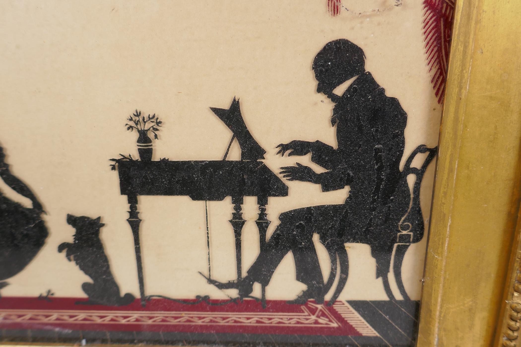 A C19th reverse painting on glass depicting a musical evening in a silhouette style, 30 x 24cm - Image 4 of 5