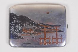 An early C20th Japanese sterling silver cigarette case with engraved decoration depicting the