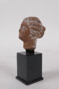 A Greco Roman terracotta votive bust, 10cm high