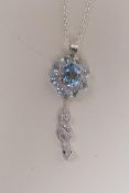 A 925 silver, cubic zirconia and blue topaz pendant necklace with cubic zirconia encrusted snake