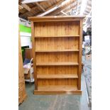 A 1970s Gibbs furniture open bookcase, 92 x 25cm, 113cm high, and a pine open bookcase on a plinth