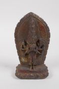 A Sino Tibetan filled gilt bronze deity, 13cm high