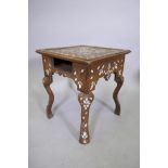 An Ottoman inlaid hardwood occasional table with losses and missing drawer, 40 x 40cms, 44cm high