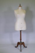 A vintage French tailor's dummy on stand, 164cm high