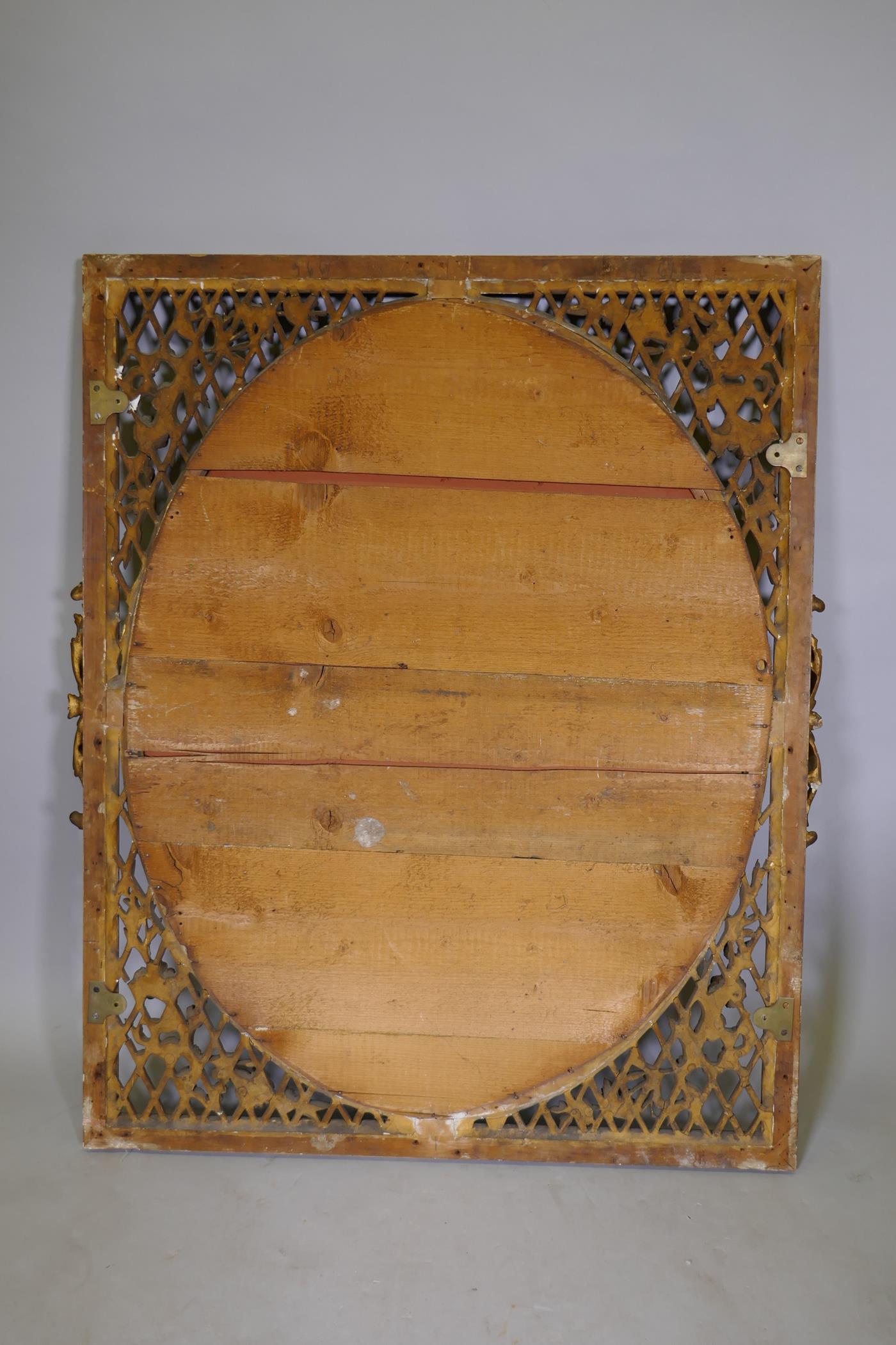 A C19th Continental giltwood and plaster wall mirror, with bevelled glass and pierced spandrels, - Image 4 of 4