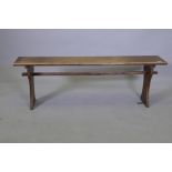 A mahogany refectory style bench, 138 x 25cms, 46cm high