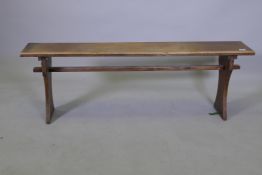 A mahogany refectory style bench, 138 x 25cms, 46cm high